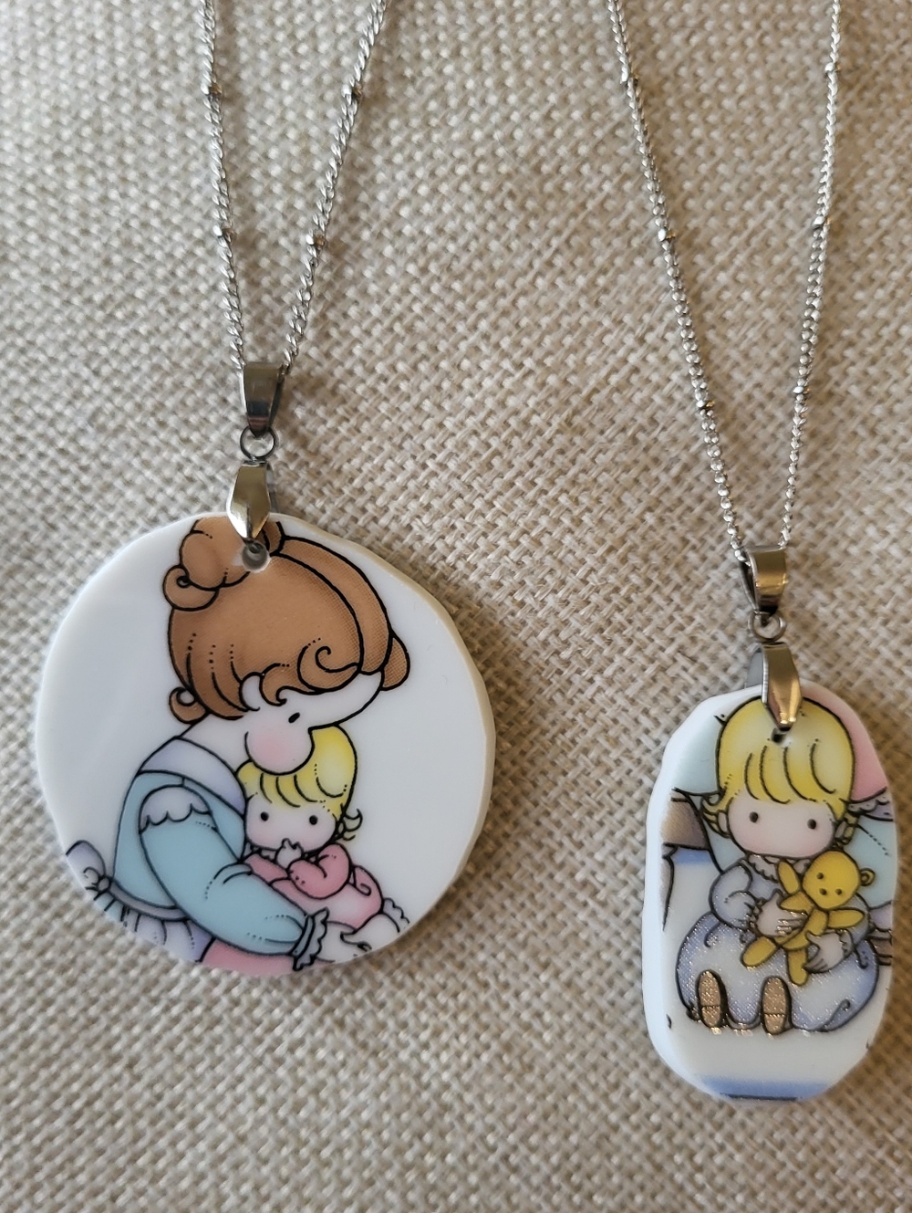 Set of 2 Pendants from Vintage Avon A Mother Is Love 1987 Mother's Day Plate